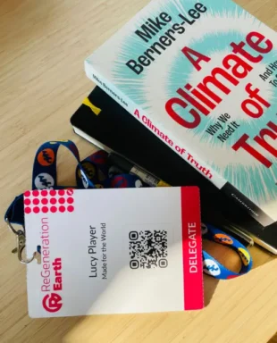 A lanyard and notebook from the ReGeneration Earth conference